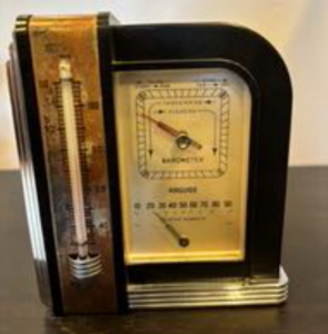 Picture of Daryl Hooles Father's Barometer, now kept on her brother's desk.